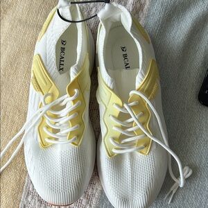 BCALLX White Knit Sneakers with Pale Yellow Accents